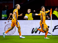 Netherlands midfielder Tijani Reijnders scores the 1-0 and celebrates the goal during the match between the Netherlands and Germany at the J...