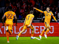 Netherlands midfielder Tijani Reijnders scores the 1-0 and celebrates the goal during the match between the Netherlands and Germany at the J...