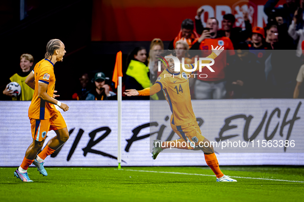 Netherlands midfielder Tijani Reijnders scores the 1-0 and celebrates the goal during the match between the Netherlands and Germany at the J...