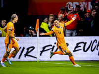 Netherlands midfielder Tijani Reijnders scores the 1-0 and celebrates the goal during the match between the Netherlands and Germany at the J...