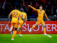 Netherlands midfielder Tijani Reijnders scores the 1-0 and celebrates the goal during the match between the Netherlands and Germany at the J...