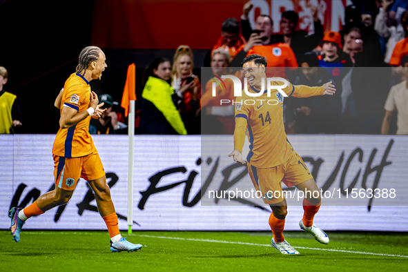 Netherlands midfielder Tijani Reijnders scores the 1-0 and celebrates the goal during the match between the Netherlands and Germany at the J...