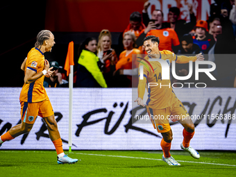 Netherlands midfielder Tijani Reijnders scores the 1-0 and celebrates the goal during the match between the Netherlands and Germany at the J...