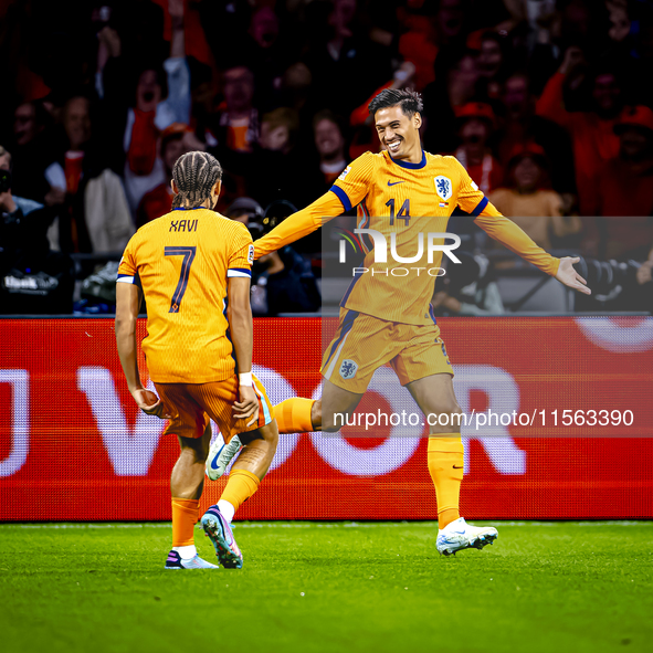 Netherlands midfielder Tijani Reijnders scores the 1-0 and celebrates the goal during the match between the Netherlands and Germany at the J...