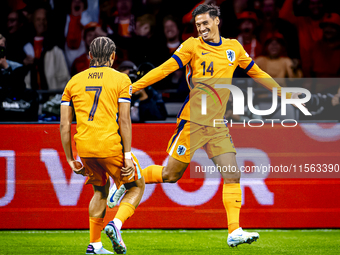 Netherlands midfielder Tijani Reijnders scores the 1-0 and celebrates the goal during the match between the Netherlands and Germany at the J...