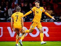 Netherlands midfielder Tijani Reijnders scores the 1-0 and celebrates the goal during the match between the Netherlands and Germany at the J...