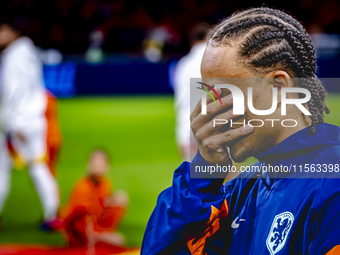 Netherlands midfielder Xavi Simons plays during the match between the Netherlands and Germany at the Johan Cruijff ArenA for the UEFA Nation...