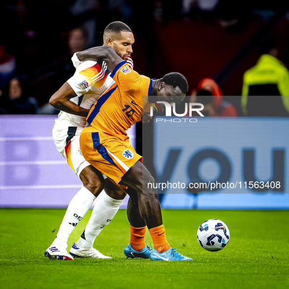 Germany defender Jonathan Tah and Netherlands forward Brian Brobbey during the match between the Netherlands and Germany at the Johan Cruijf...