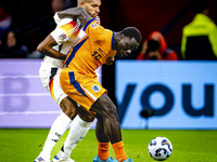 Germany defender Jonathan Tah and Netherlands forward Brian Brobbey during the match between the Netherlands and Germany at the Johan Cruijf...