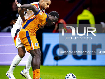 Germany defender Jonathan Tah and Netherlands forward Brian Brobbey during the match between the Netherlands and Germany at the Johan Cruijf...