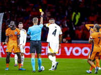 Germany defender Jonathan Tah receives a yellow card during the match between the Netherlands and Germany at the Johan Cruijff ArenA for the...