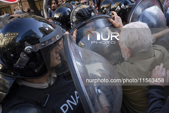 Police repress retirees outside the Argentine National Congress due to President Javier Milei's veto of the increase in pensions in Buenos A...