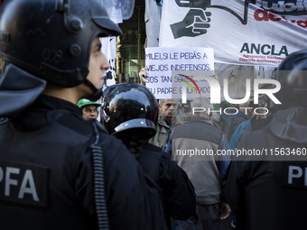 Police repress retirees outside the Argentine National Congress due to President Javier Milei's veto of the increase in pensions in Buenos A...