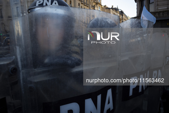 Police repress retirees outside the Argentine National Congress due to President Javier Milei's veto of the increase in pensions in Buenos A...