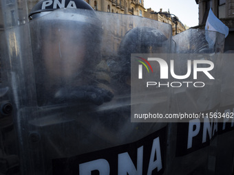 Police repress retirees outside the Argentine National Congress due to President Javier Milei's veto of the increase in pensions in Buenos A...