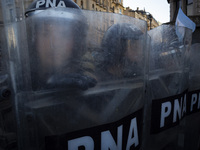 Police repress retirees outside the Argentine National Congress due to President Javier Milei's veto of the increase in pensions in Buenos A...