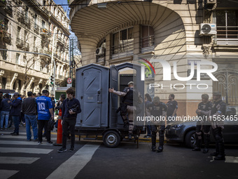 Police repress retirees outside the Argentine National Congress due to President Javier Milei's veto of the increase in pensions in Buenos A...