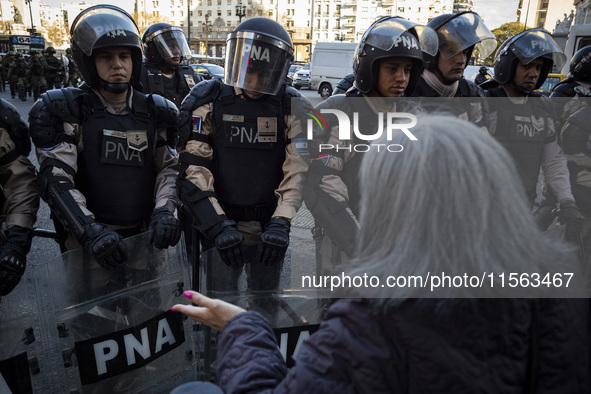 Police repress retirees outside the Argentine National Congress due to President Javier Milei's veto of the increase in pensions in Buenos A...