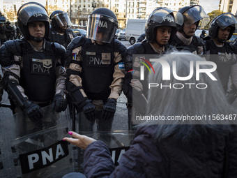 Police repress retirees outside the Argentine National Congress due to President Javier Milei's veto of the increase in pensions in Buenos A...