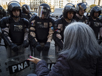 Police repress retirees outside the Argentine National Congress due to President Javier Milei's veto of the increase in pensions in Buenos A...