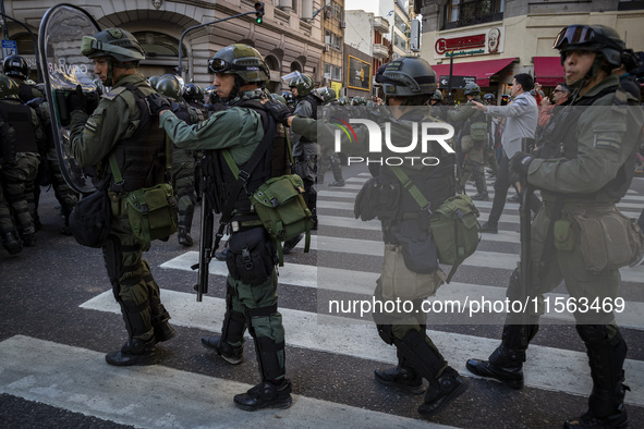 Police repress retirees outside the Argentine National Congress due to President Javier Milei's veto of the increase in pensions in Buenos A...