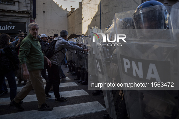 Police repress retirees outside the Argentine National Congress due to President Javier Milei's veto of the increase in pensions in Buenos A...