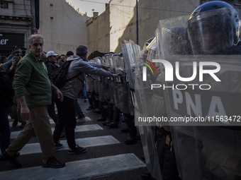 Police repress retirees outside the Argentine National Congress due to President Javier Milei's veto of the increase in pensions in Buenos A...