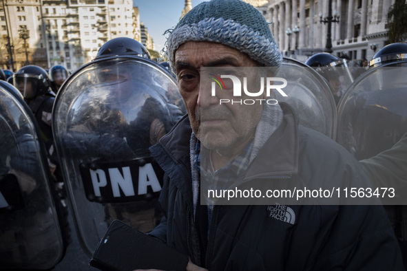 Police repress retirees outside the Argentine National Congress due to President Javier Milei's veto of the increase in pensions in Buenos A...