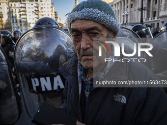 Police repress retirees outside the Argentine National Congress due to President Javier Milei's veto of the increase in pensions in Buenos A...