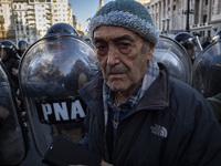 Police repress retirees outside the Argentine National Congress due to President Javier Milei's veto of the increase in pensions in Buenos A...