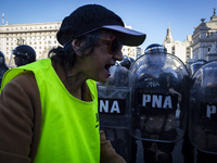 Police repress retirees outside the Argentine National Congress due to President Javier Milei's veto of the increase in pensions in Buenos A...