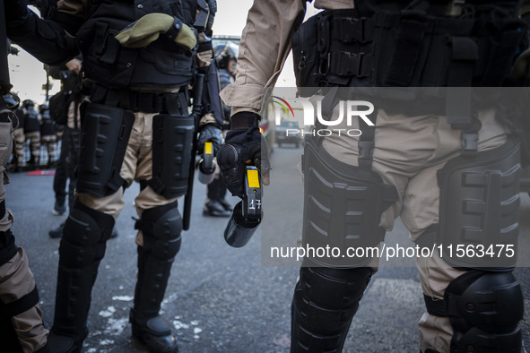 Police repress retirees outside the Argentine National Congress due to President Javier Milei's veto of the increase in pensions in Buenos A...