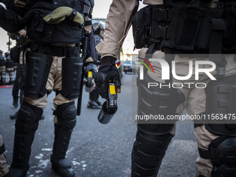 Police repress retirees outside the Argentine National Congress due to President Javier Milei's veto of the increase in pensions in Buenos A...