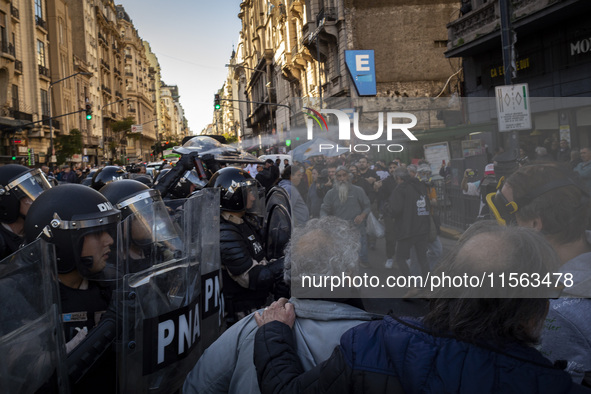 Police repress retirees outside the Argentine National Congress due to President Javier Milei's veto of the increase in pensions in Buenos A...