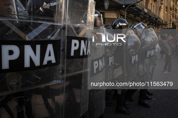 Police repress retirees outside the Argentine National Congress due to President Javier Milei's veto of the increase in pensions in Buenos A...