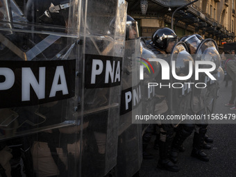 Police repress retirees outside the Argentine National Congress due to President Javier Milei's veto of the increase in pensions in Buenos A...