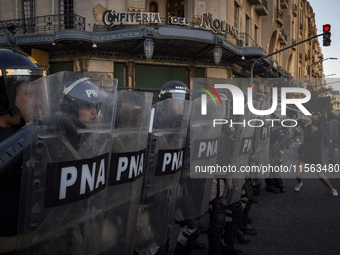 Police repress retirees outside the Argentine National Congress due to President Javier Milei's veto of the increase in pensions in Buenos A...