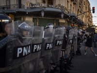 Police repress retirees outside the Argentine National Congress due to President Javier Milei's veto of the increase in pensions in Buenos A...