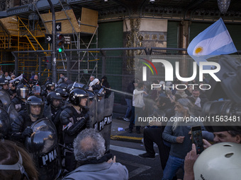 Police repress retirees outside the Argentine National Congress due to President Javier Milei's veto of the increase in pensions in Buenos A...