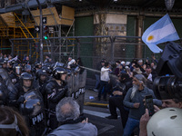 Police repress retirees outside the Argentine National Congress due to President Javier Milei's veto of the increase in pensions in Buenos A...