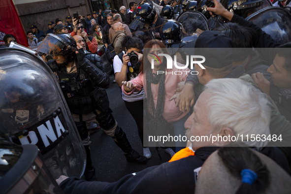 Police repress retirees outside the Argentine National Congress due to President Javier Milei's veto of the increase in pensions in Buenos A...