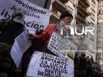 Police repress retirees outside the Argentine National Congress due to President Javier Milei's veto of the increase in pensions in Buenos A...