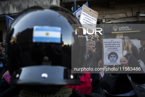 Police repress retirees outside the Argentine National Congress due to President Javier Milei's veto of the increase in pensions in Buenos A...