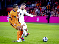 Netherlands midfielder Tijani Reijnders and Germany forward Deniz Undav during the match between the Netherlands and Germany at the Johan Cr...