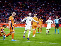 Germany forward Deniz Undav scores the 1-1 during the match between the Netherlands and Germany at the Johan Cruijff ArenA for the UEFA Nati...