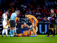 Netherlands defender Nathan Ake gets injured during the match between the Netherlands and Germany at the Johan Cruijff ArenA for the UEFA Na...