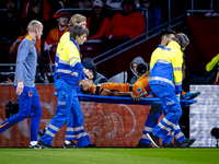 Netherlands defender Nathan Ake gets injured during the match between the Netherlands and Germany at the Johan Cruijff ArenA for the UEFA Na...