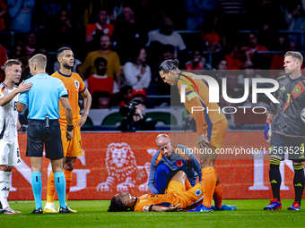 Netherlands defender Nathan Ake gets injured during the match between the Netherlands and Germany at the Johan Cruijff ArenA for the UEFA Na...