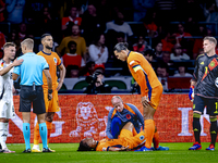 Netherlands defender Nathan Ake gets injured during the match between the Netherlands and Germany at the Johan Cruijff ArenA for the UEFA Na...