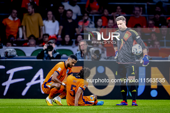 Netherlands defender Nathan Ake gets injured during the match between the Netherlands and Germany at the Johan Cruijff ArenA for the UEFA Na...